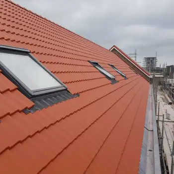 Dakpannen coaten van acht woningen in Almere