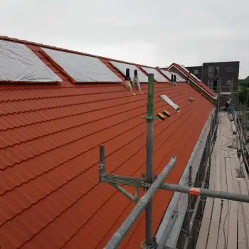 Dakpannen coaten van acht woningen in Almere