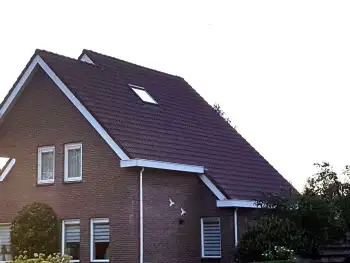 Dakcoating op woning in Nieuw Buinen