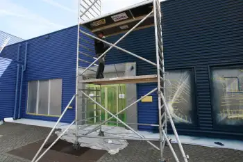 Nieuwe gevelcoating voor bedrijfspand met behulp van airless coating