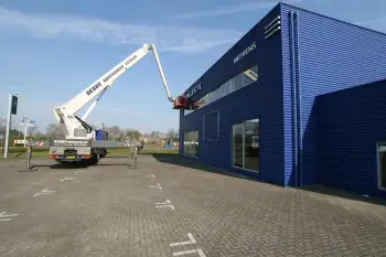 Nieuwe gevelcoating voor bedrijfspand met behulp van airless coating