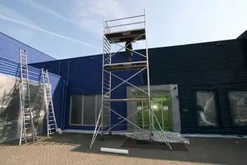 Nieuwe gevelcoating voor bedrijfspand met behulp van airless coating