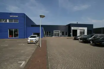 Nieuwe gevelcoating voor bedrijfspand met behulp van airless coating