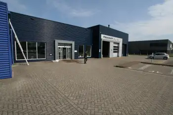 Nieuwe gevelcoating voor bedrijfspand met behulp van airless coating