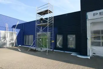 Nieuwe gevelcoating voor bedrijfspand met behulp van airless coating