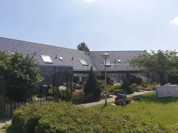 Swifterband meerdere woningen van Woningstichting OFW voorzien van dakcoating.