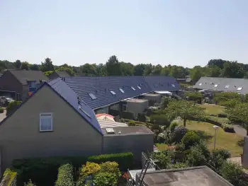 Swifterband meerdere woningen van Woningstichting OFW voorzien van dakcoating.