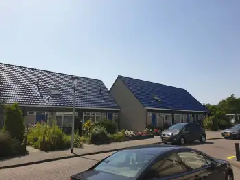 Swifterband meerdere woningen van Woningstichting OFW voorzien van dakcoating.