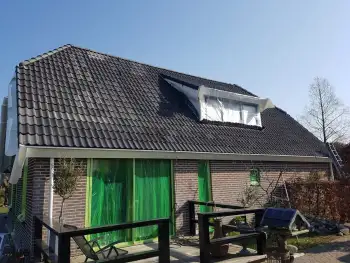 Gevelcoating van woonhuis in Wapenveld