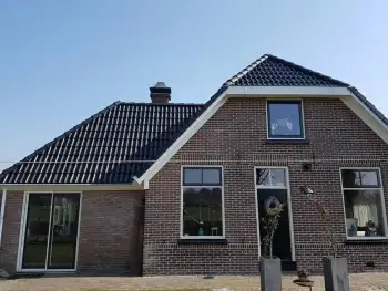 Gevelcoating van woonhuis in Wapenveld