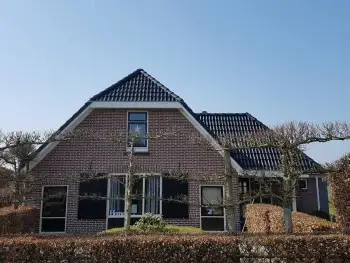 Gevelcoating van woonhuis in Wapenveld