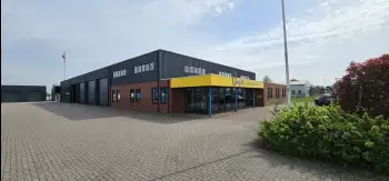 Velgsib - bedrijfspand coaten in Stadskanaal doormiddel van coating op de gevel spuiten.