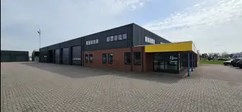 Velgsib - bedrijfspand coaten in Stadskanaal doormiddel van coating op de gevel spuiten.